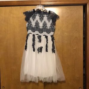 Size medium white with black lace dress